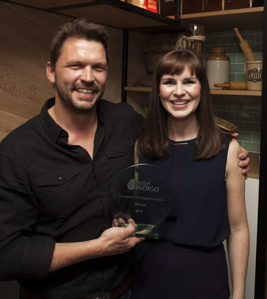 TV presenter Jimmy Doherty with Hotel Indigo Flavours of the Neighbourhood food competition Winner Kerry Deryshire from Broighter Gold, both dressed in black at the Awards Ceremony