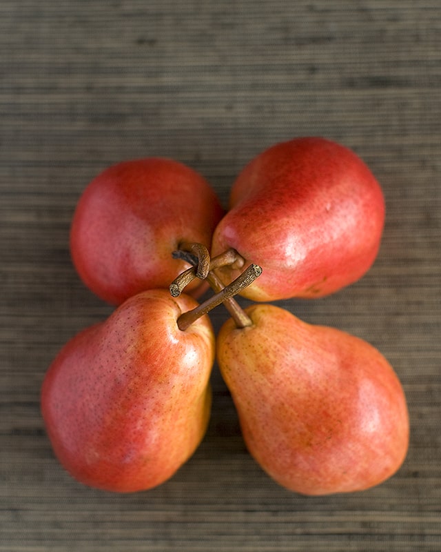 4 red pears photographed by Rick Foulsham