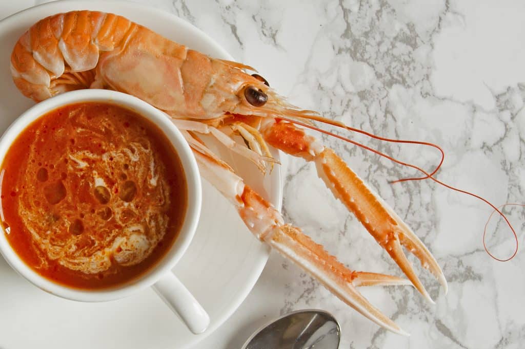 Bartlobster & langoustine bisque with whole langoustine